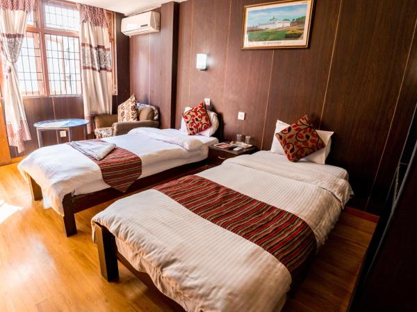 Traveler's Holiday Inn : photo 2 de la chambre chambre double ou lits jumeaux standard