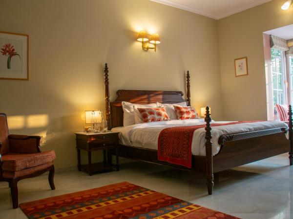 Naila Kothi - A Luxury Boutique Royal Suites in Jaipur : photo 10 de la chambre chambre lit king-size - vue sur jardin