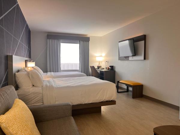 Comfort Suites Louisville Airport : photo 7 de la chambre suite lit queen-size