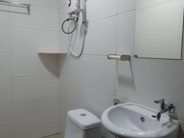 Thian Siong Inn : photo 4 de la chambre chambre triple basique avec salle de bains commune