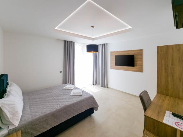 Maresole Beachfront Residence : photo 5 de la chambre chambre quadruple