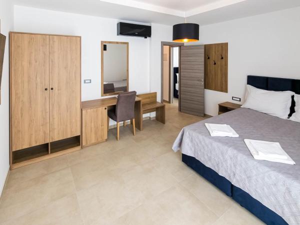 Maresole Beachfront Residence : photo 6 de la chambre chambre quadruple