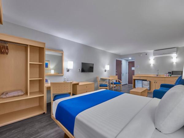 City Express by Marriott Puebla Angelopolis : photo 4 de la chambre suite lit queen-size avec canapé-lit