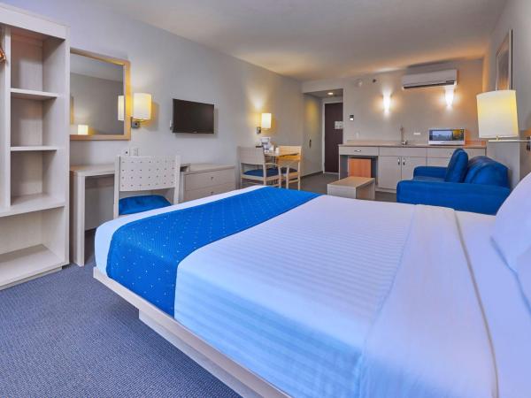 City Express by Marriott Puebla Angelopolis : photo 5 de la chambre suite lit queen-size avec canapé-lit