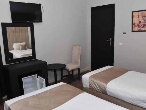 Cadé Hotel : photo 3 de la chambre chambre lits jumeaux