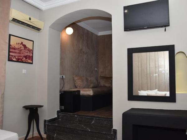 Cadé Hotel : photo 4 de la chambre chambre triple