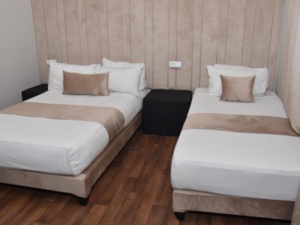 Cadé Hotel : photo 3 de la chambre chambre triple