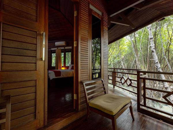 RedDoorz Resort @ Taman Wisata Mangrove : photo 6 de la chambre suite deluxe