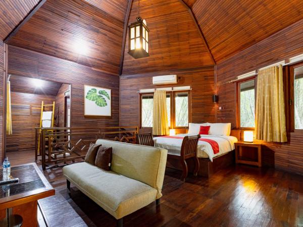 RedDoorz Resort @ Taman Wisata Mangrove : photo 1 de la chambre suite deluxe