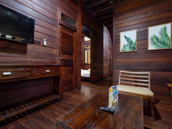 RedDoorz Resort @ Taman Wisata Mangrove : photo 10 de la chambre chambre familiale