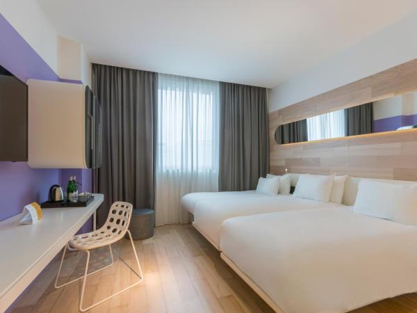 voco Milan-Fiere, an IHG Hotel : photo 2 de la chambre chambre lits jumeaux standard avec lit d'appoint