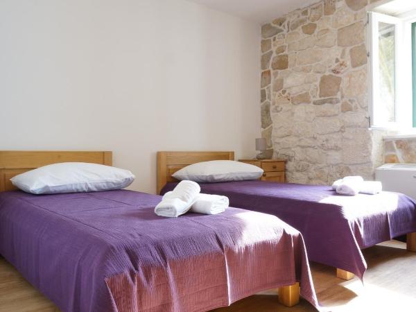 Guest house Jere Old Town : photo 2 de la chambre chambre double ou lits jumeaux avec lit d'appoint