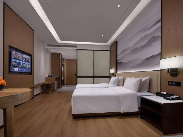 Metropark Hotel Wuhan : photo 3 de la chambre chambre lits jumeaux hollywood