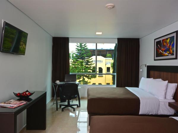 Hotel & Suites PF : photo 1 de la chambre suite exécutive avec 2 lits doubles