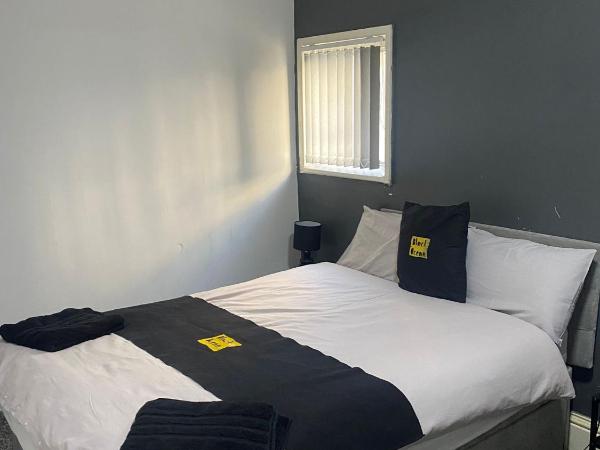 Black Ocean Holiday Apartments : photo 3 de la chambre appartement