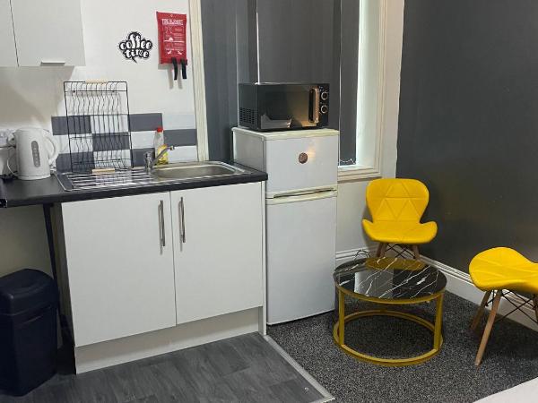 Black Ocean Holiday Apartments : photo 4 de la chambre studio