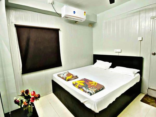 Homestay Ac Dormitory : photo 6 de la chambre chambre double familiale