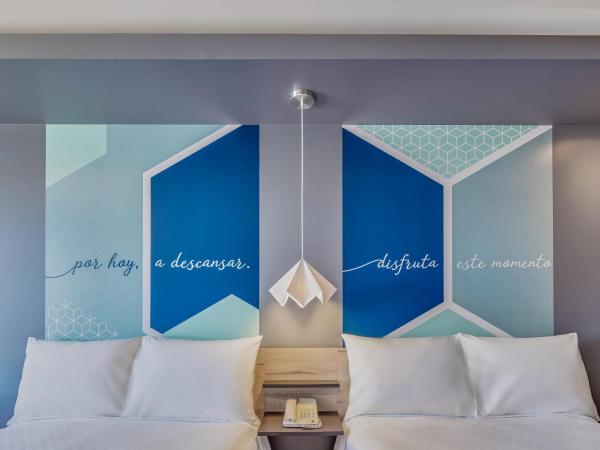 One Morelia Acueducto : photo 3 de la chambre chambre 2 lits jumeaux supérieure