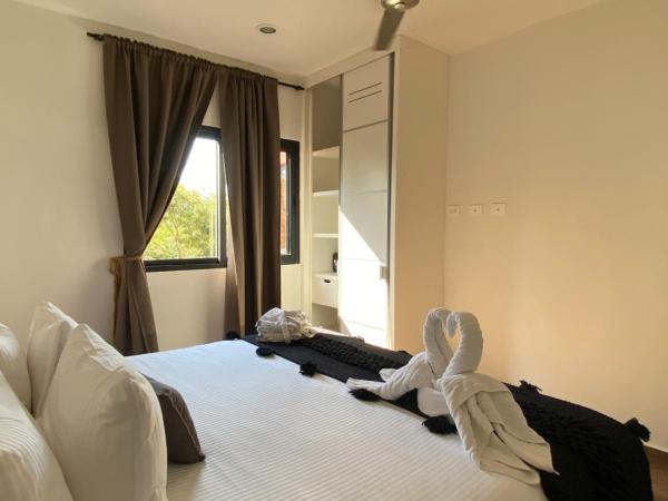 Panacea Condo Tulum : photo 8 de la chambre suite junior avec piscine privée