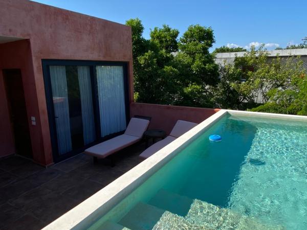 Panacea Condo Tulum : photo 10 de la chambre suite junior avec piscine privée