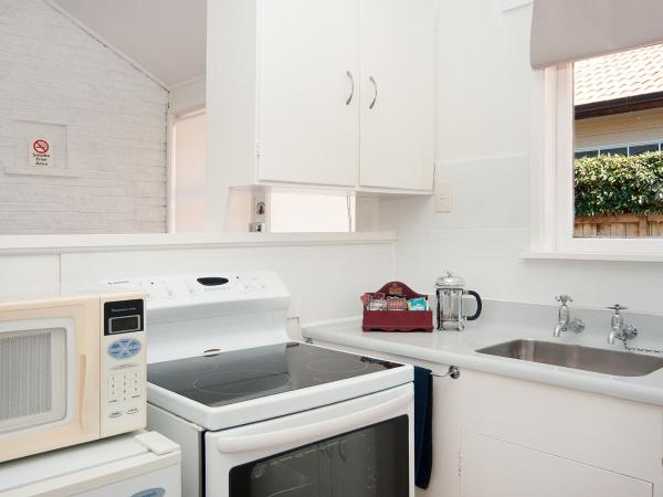 Aarangi Motel : photo 6 de la chambre chambre familiale - vue sur jardin