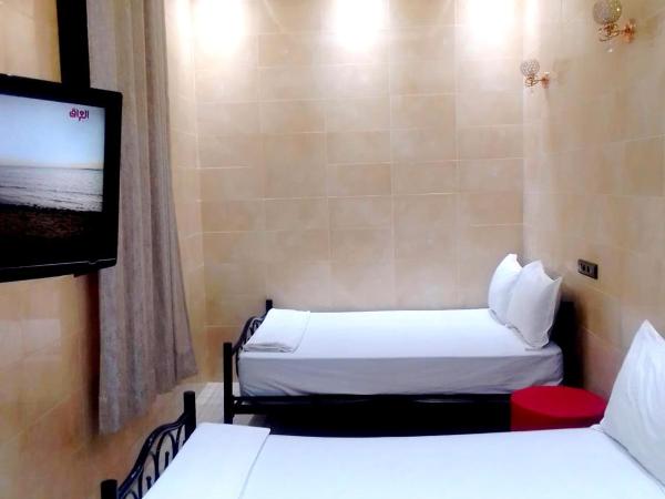 Résidence Miramare Marrakech : photo 10 de la chambre chambre triple avec salle de bains privative