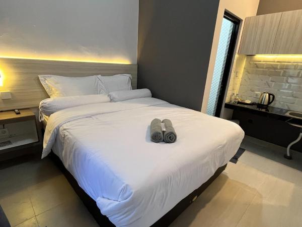 Kaira Room Guest House Syariah Mitra RedDoorz : photo 1 de la chambre chambre double standard