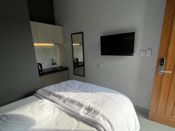 Kaira Room Guest House Syariah Mitra RedDoorz : photo 5 de la chambre chambre double standard