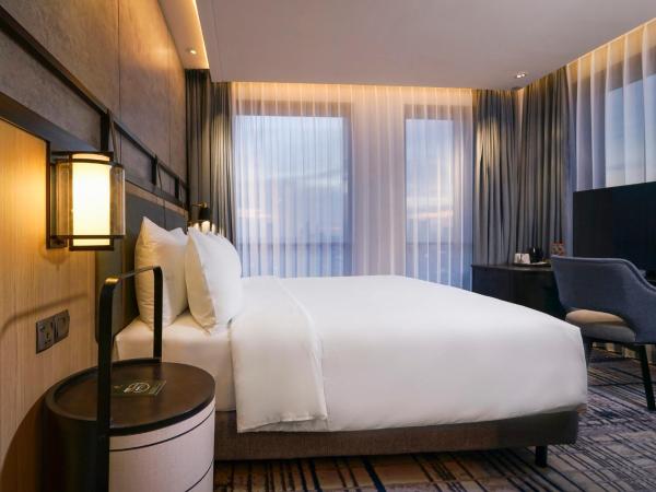 Mercure Surabaya Manyar : photo 1 de la chambre deluxe twin room - city side