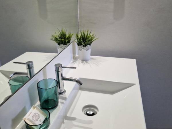 VAGO Alcântara Suites : photo 4 de la chambre chambre double standard