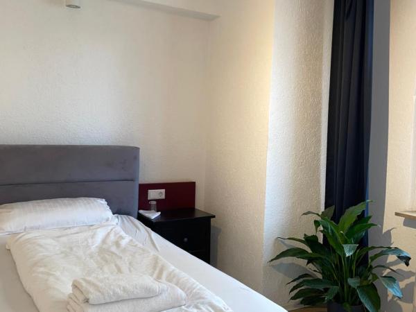 24-7 Stadthotel Stuttgart : photo 5 de la chambre chambre triple confort
