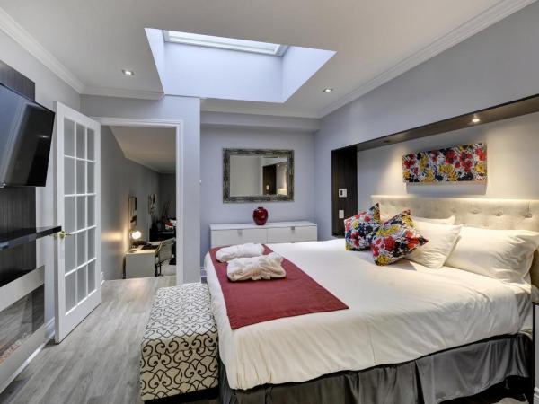 Travelodge by Wyndham Quebec City Hotel & Convention Centre : photo 2 de la chambre suite prestige avec lit king-size - non-fumeurs