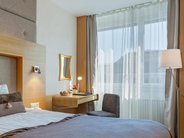 Continental Hotel Lausanne : photo 5 de la chambre chambre lits jumeaux Économique