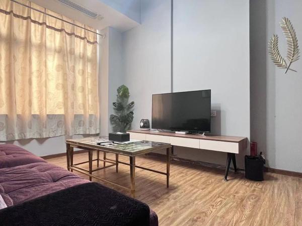 广州沃家国际公寓 : photo 2 de la chambre studio duplex