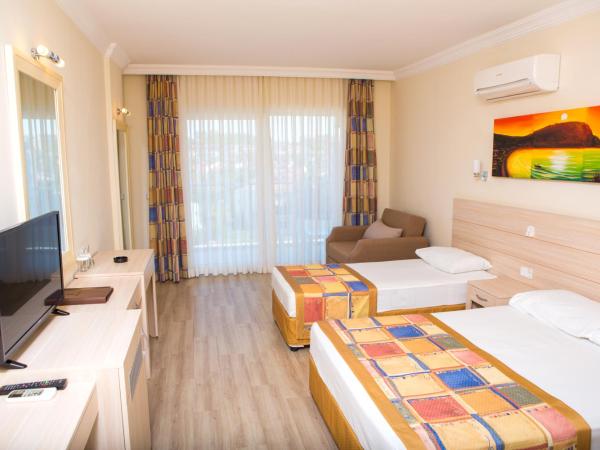 Gardenia Beach : photo 4 de la chambre chambre triple standard