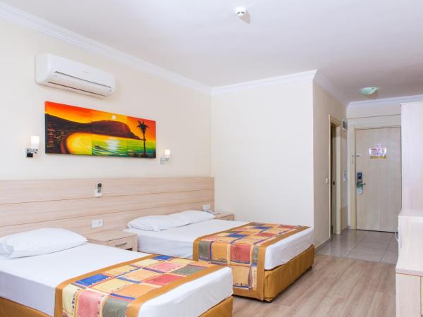 Gardenia Beach : photo 2 de la chambre chambre triple standard