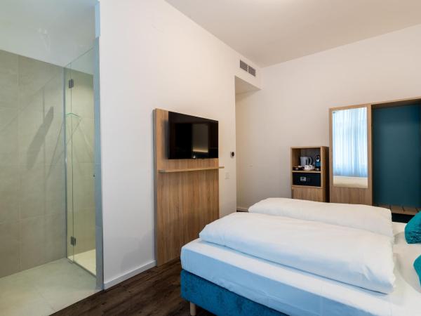 DaunTown Rooms - Self Check-In : photo 2 de la chambre chambre double deluxe