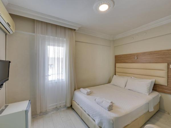 Hikmethan Otel : photo 10 de la chambre chambre double standard