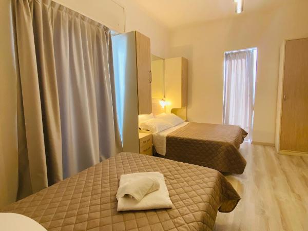 Hotel Butterfly : photo 4 de la chambre chambre triple