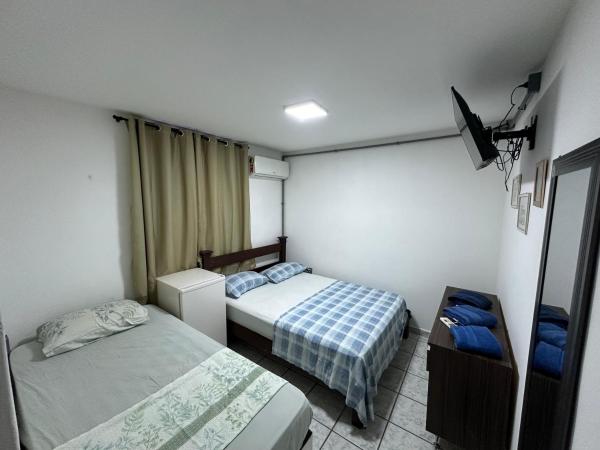 Dunas Hostel : photo 4 de la chambre chambre quadruple avec salle de bains privative