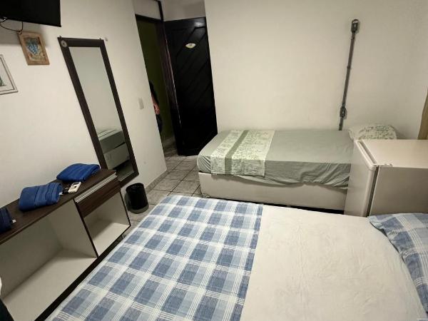Dunas Hostel : photo 2 de la chambre chambre quadruple avec salle de bains privative