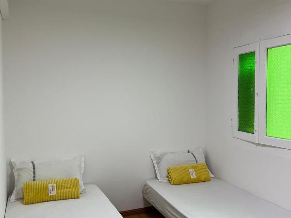 Duke Living : photo 4 de la chambre chambre lits jumeaux avec salle de bains