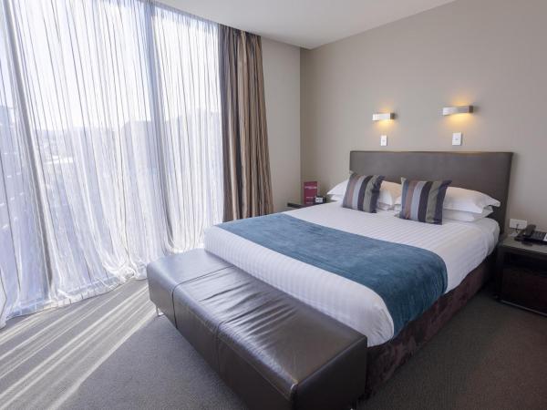 Mantra Collins Hotel : photo 1 de la chambre chambre lit queen-size 