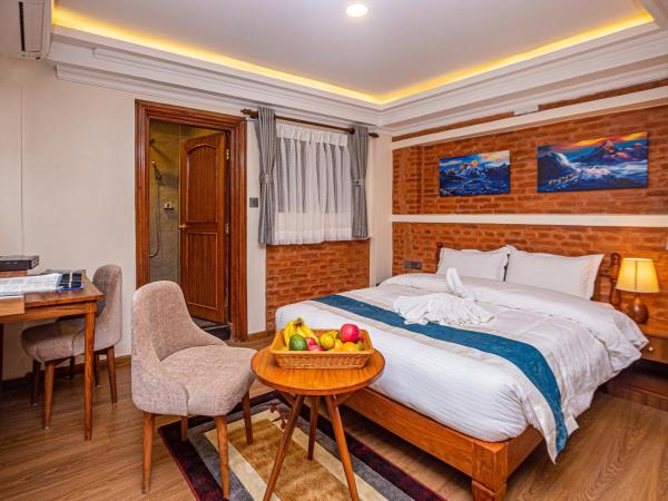 Darbar Heritage Inn : photo 3 de la chambre chambre lit queen-size deluxe