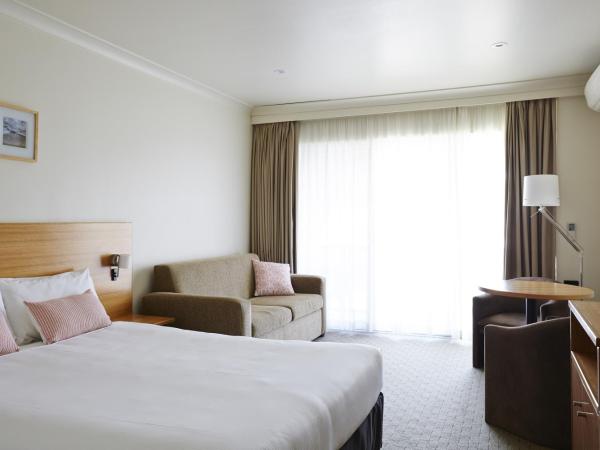 Bay Beach Motel : photo 2 de la chambre hébergement lit queen-size supérieur avec balcon - 1er Étage