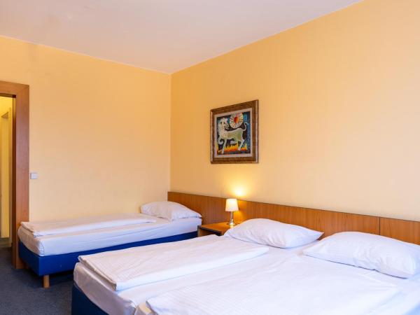 Good Morning + Berlin City East : photo 2 de la chambre chambre triple standard