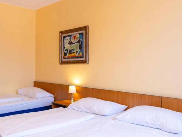 Good Morning + Berlin City East : photo 4 de la chambre chambre triple standard