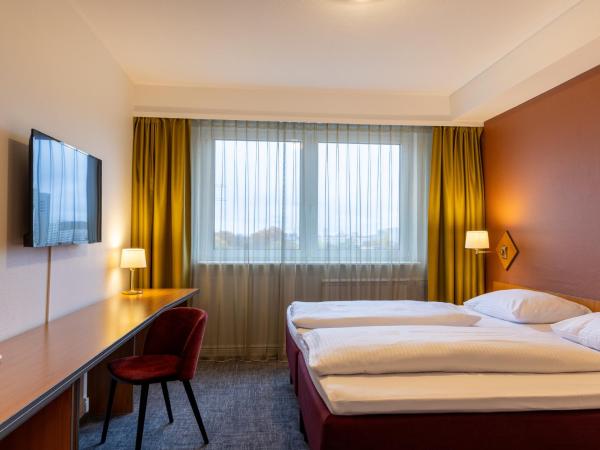 Good Morning + Berlin City East : photo 8 de la chambre chambre lits jumeaux standard+