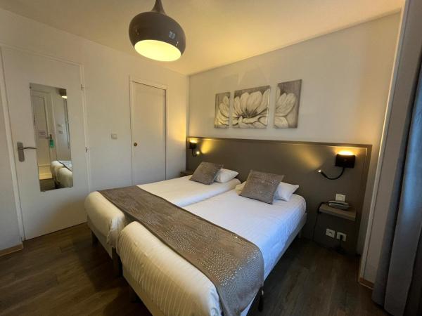 Cit'Hotel Le Cheval Blanc Cognac Centre : photo 2 de la chambre chambre lits jumeaux