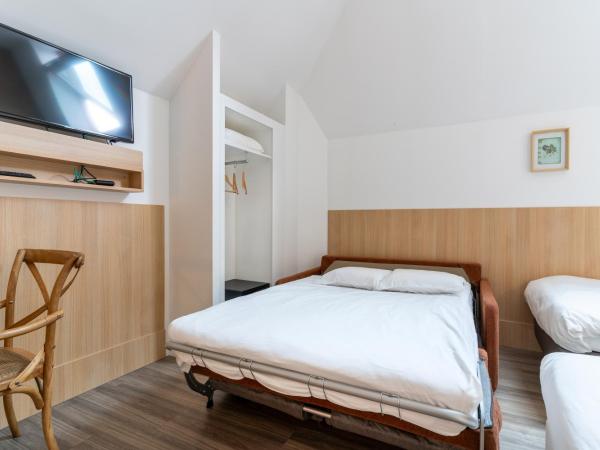 CALM Appart' & Hostel : photo 5 de la chambre appartement lit double de luxe